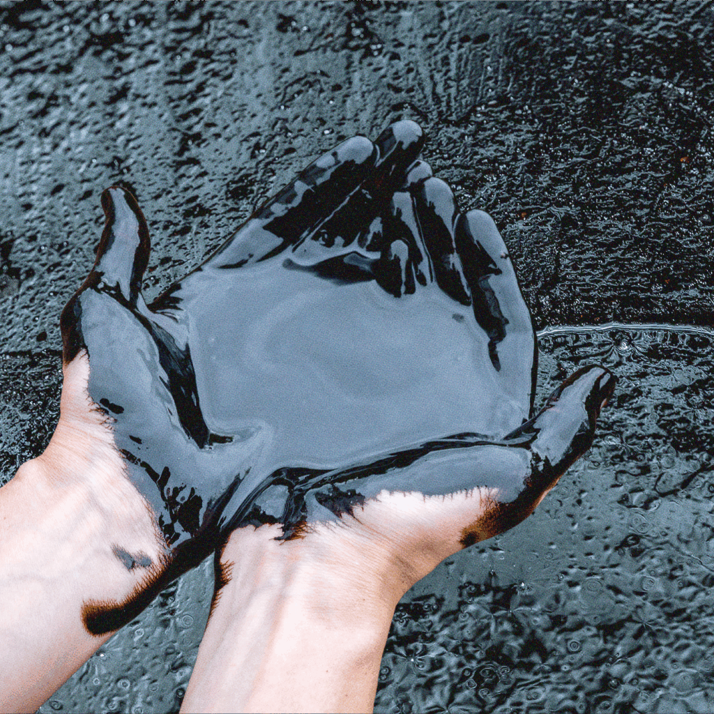 Hands covered in oil